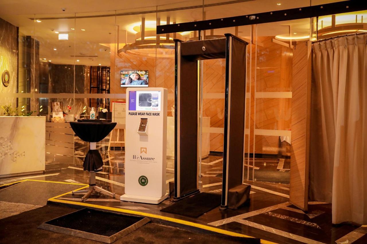 ウェルカムホテル コインバトール メンバー Itc ホテル グループ エクステリア 写真 A disinfection door at a hotel